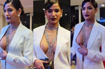 Poonam Pandey has oops moment as she sizzles in power suit without bra, Watch